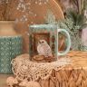 “Winged Embroideress” Mug