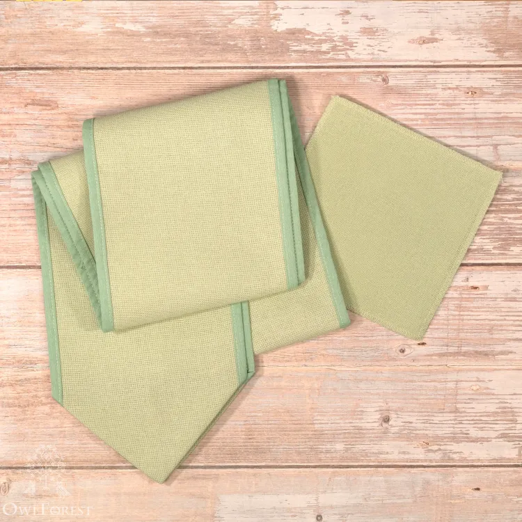 Fabric with binding for the “Pine Bow” chart